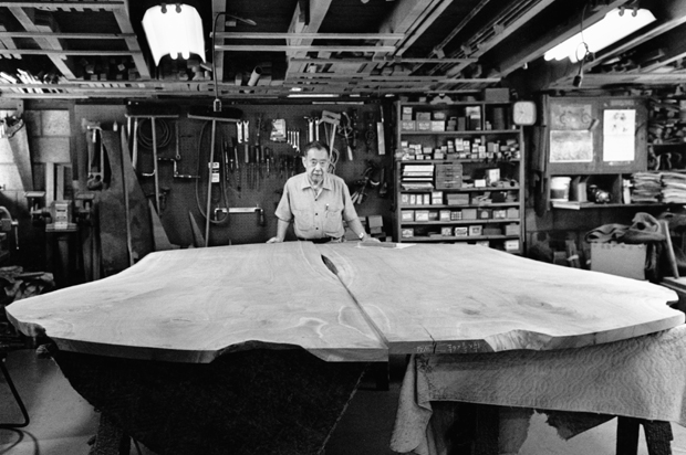 George Nakashima in 1986, taken with the Peace Altar Table in the workshop George Nakashima in 1986, taken with the Peace Altar Table in the workshop