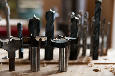 Drill bits used to drill out holes in the wood.