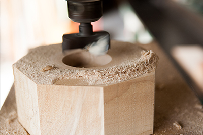 Kenichi turns a hole in the back of another blank, this will be used to attach to the lathe.