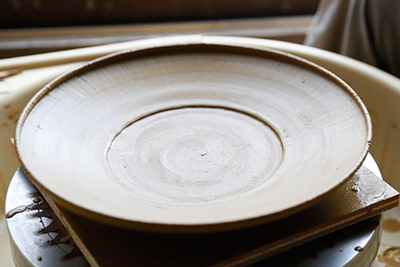 The final form made from stoneware clay, this will be trimmed and fired once dry.